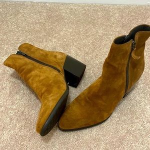 Beautiful suede Clark’s booties.  Never been worn!  Great with jeans or a dress!